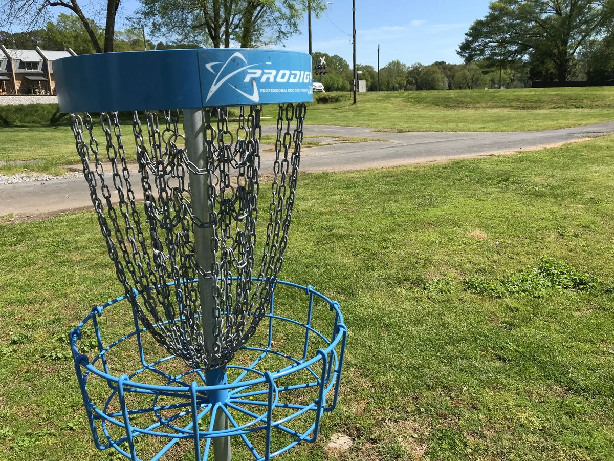 No. 6 basket. Next tee across street and down bank. Be careful of traffic.