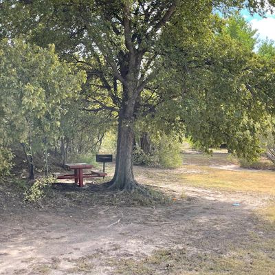 Lots of picnic areas and amenities. Fresh water spickets, picnic tables, grills, clean restrooms, and a playground for the kids.