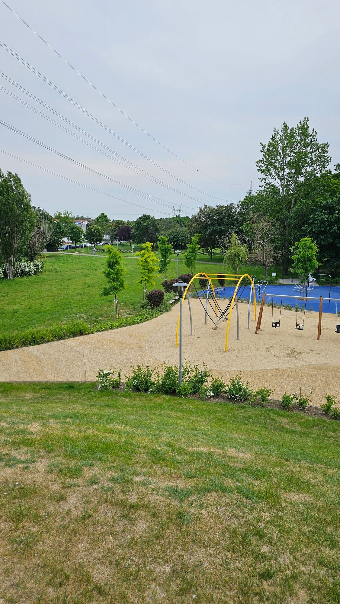 Top of playground hill is the tee pad for hole 9 Februar layout. Nice small elevation shot down.