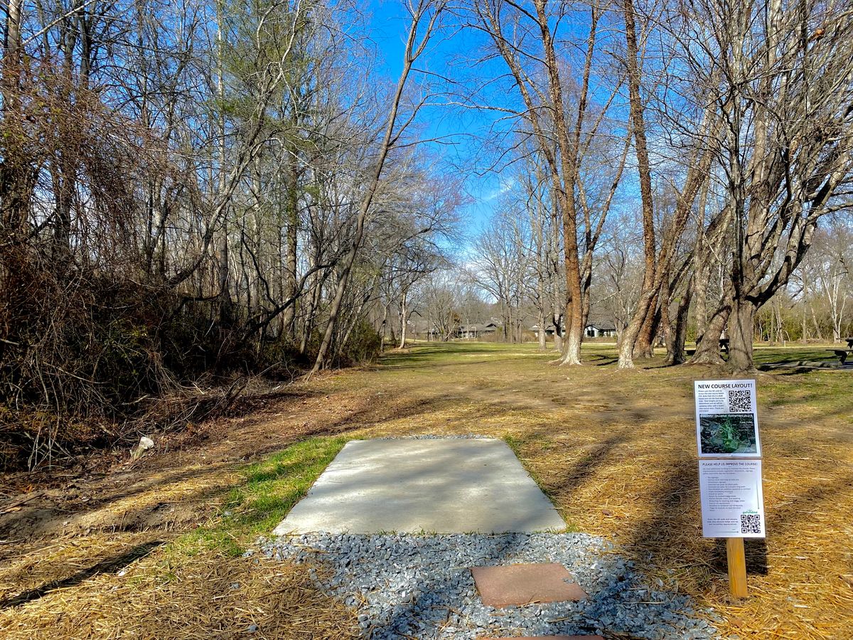Hole 8’s white tee
