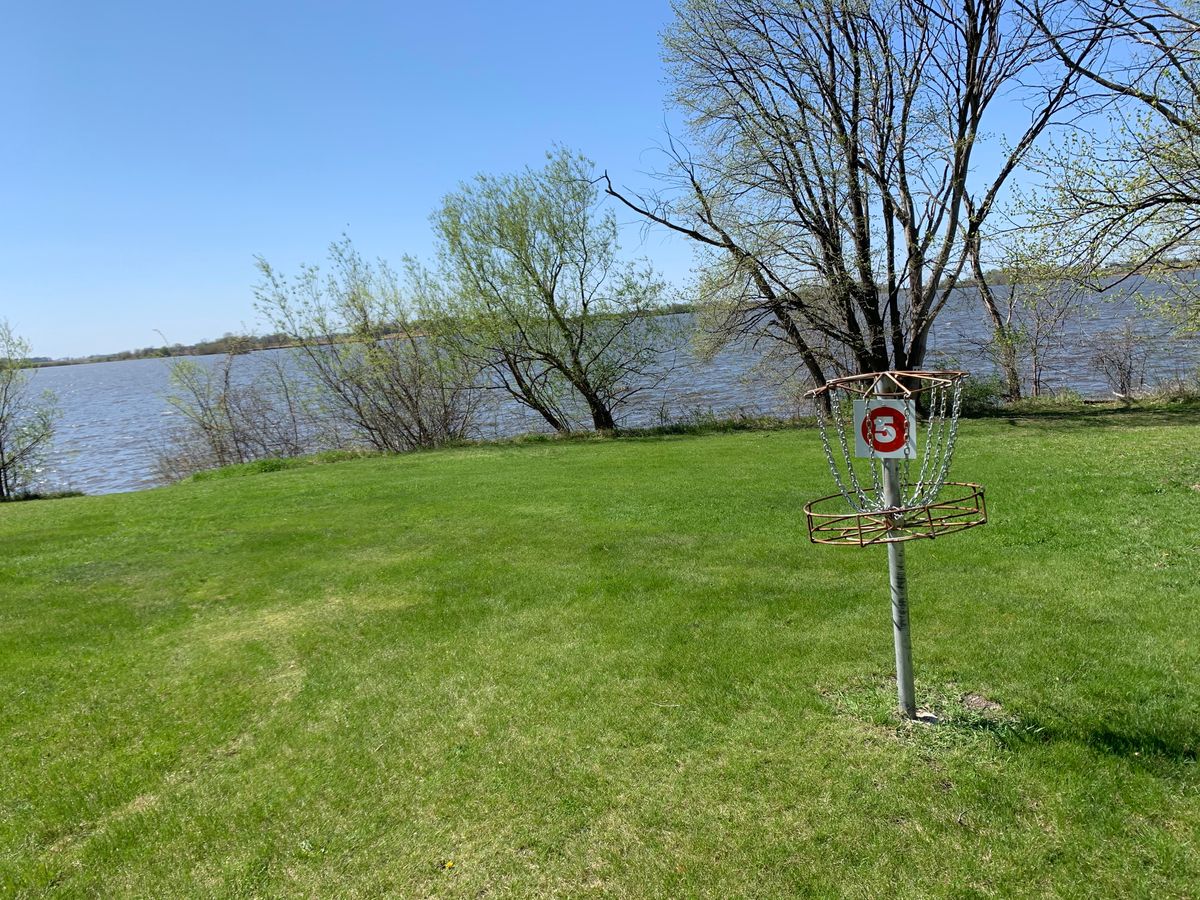 Hole 5 down by the lake. Rest of the course plays through mature trees.