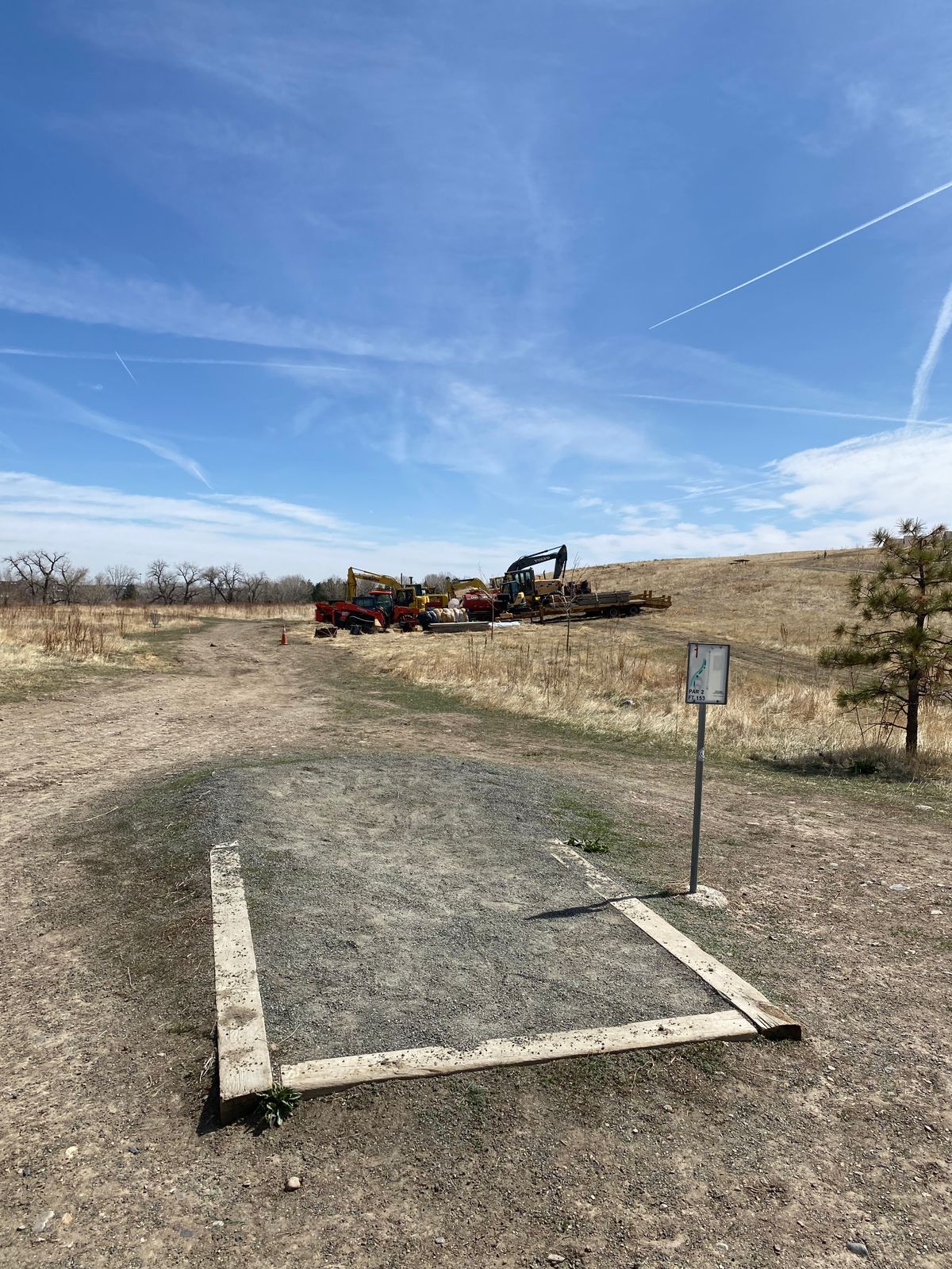 Construction equipment parked on hole 9