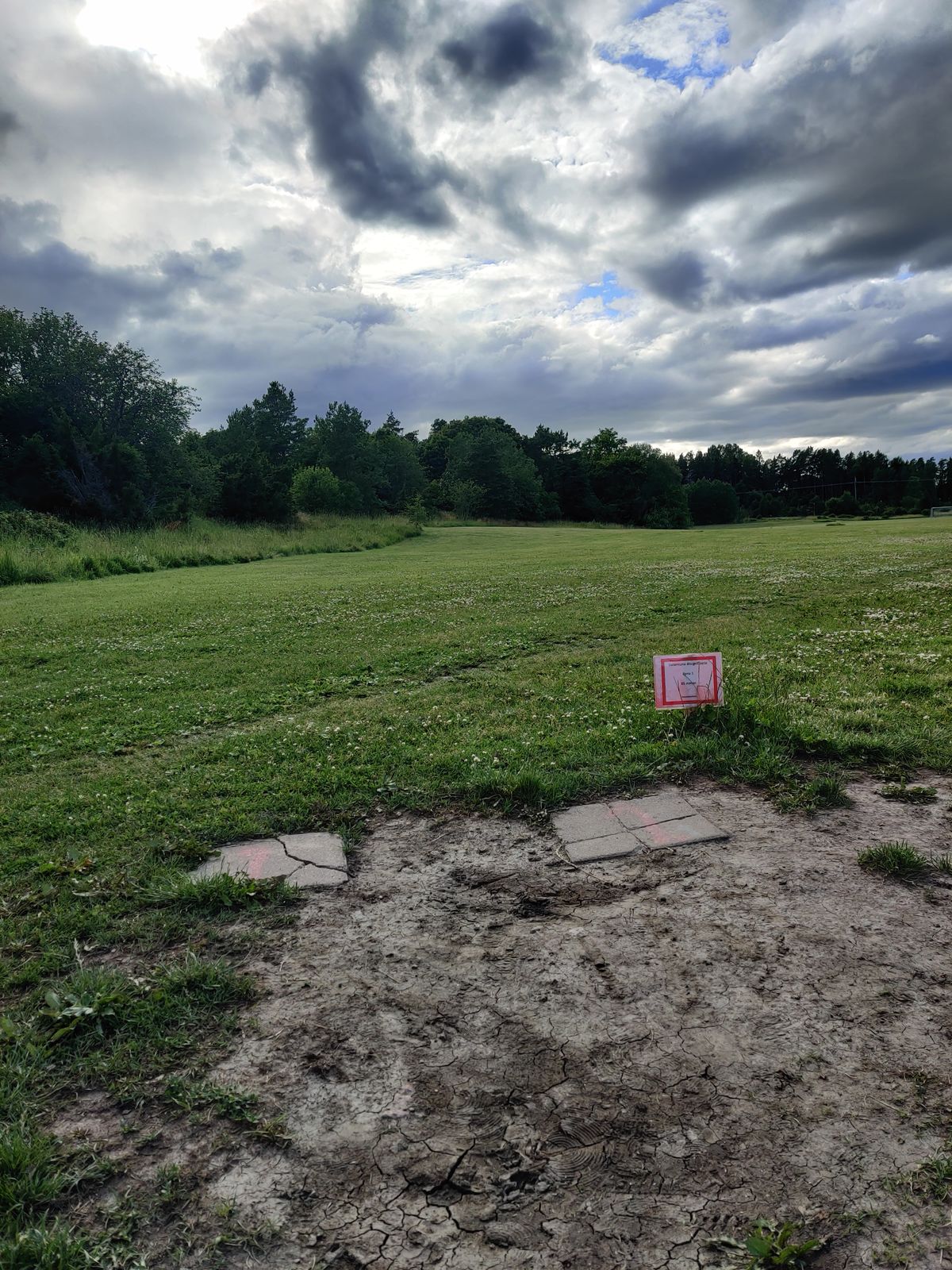 Hole 1 straight forward with a fade left in to the woods in the end.