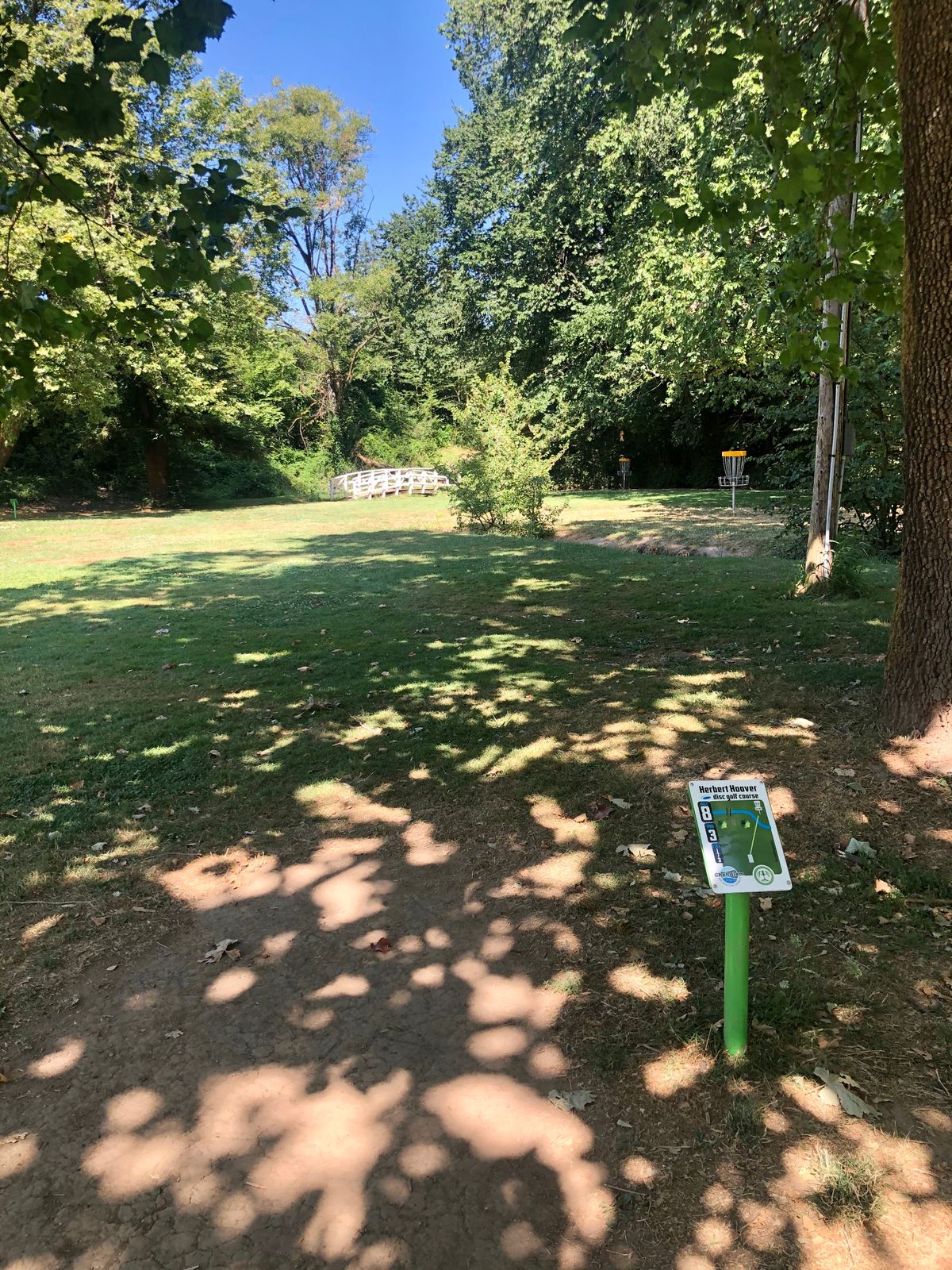 Hole 8 teepad. Basket is the far one tucked into the back corner