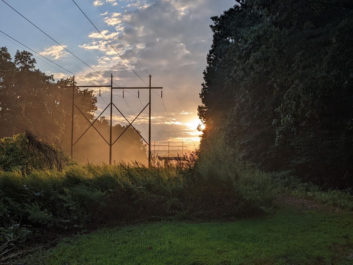 Hole 2's green with a beautiful sunset
