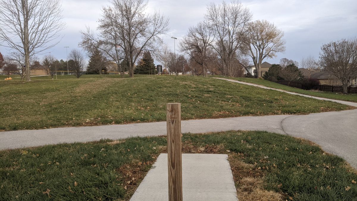 Tee #2. (Basket in line with post over small hill)