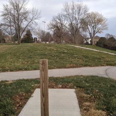 Tee #2. (Basket in line with post over small hill)