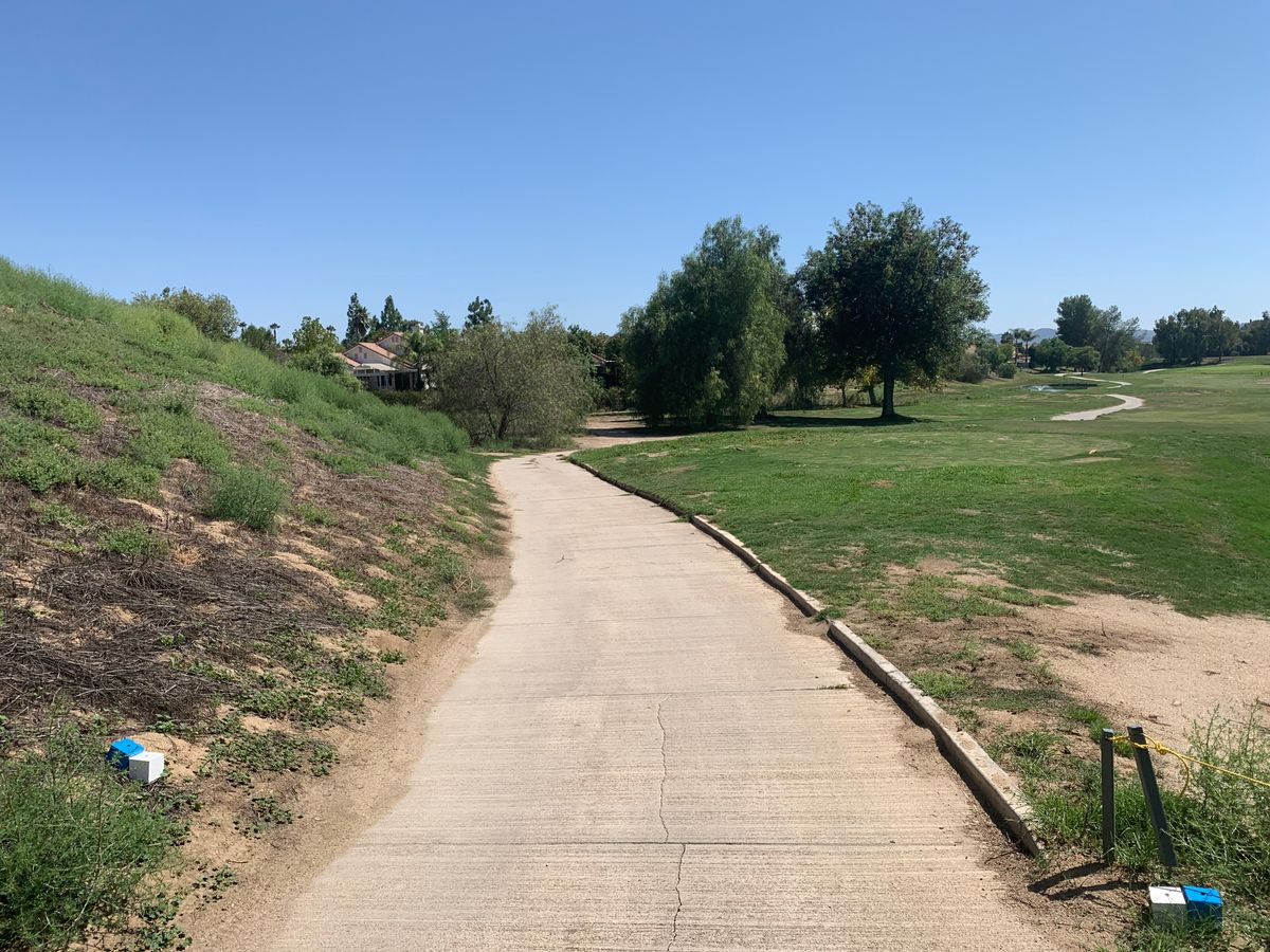 Omega Hole 15 Tee