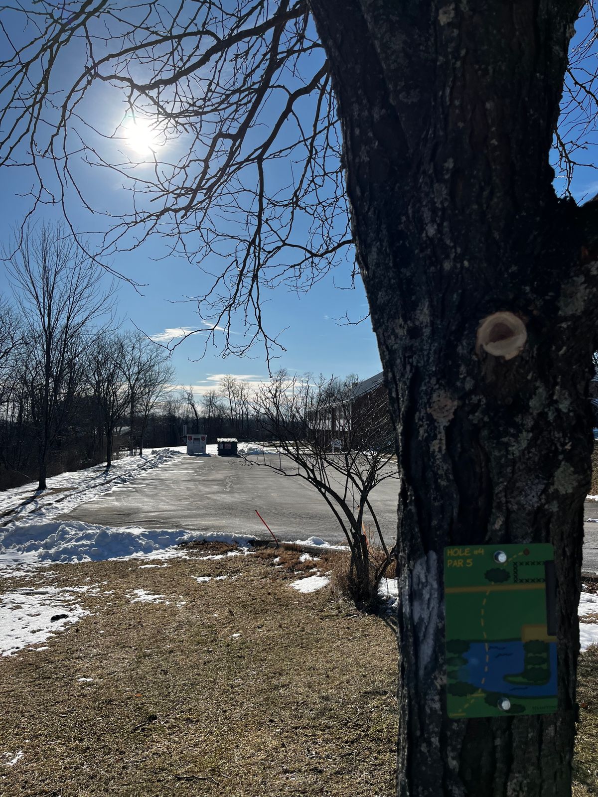 Hole 4
Par 5

Landing in parking lot is water hazard for Advance play. 