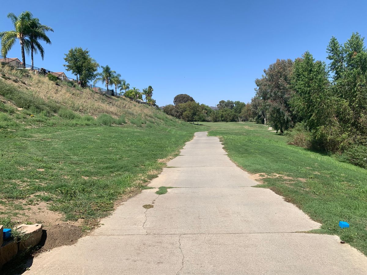 Omega Hole 10 Tee