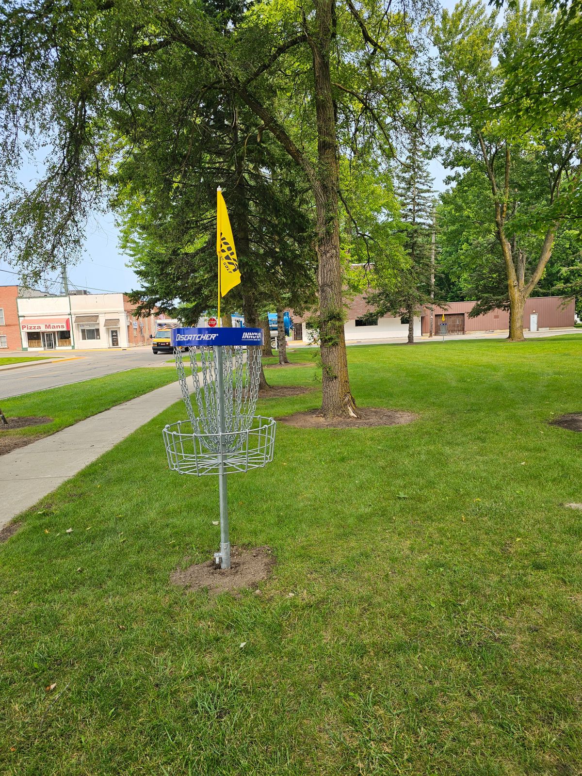 Hole 7 basket to tee. One of the most challenging, but still fairly easy shots. Harder to ace.