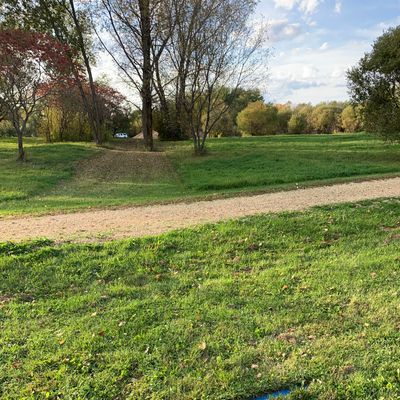 Hole 5 blue tee doesn’t have flag and is on the east side of the road.
