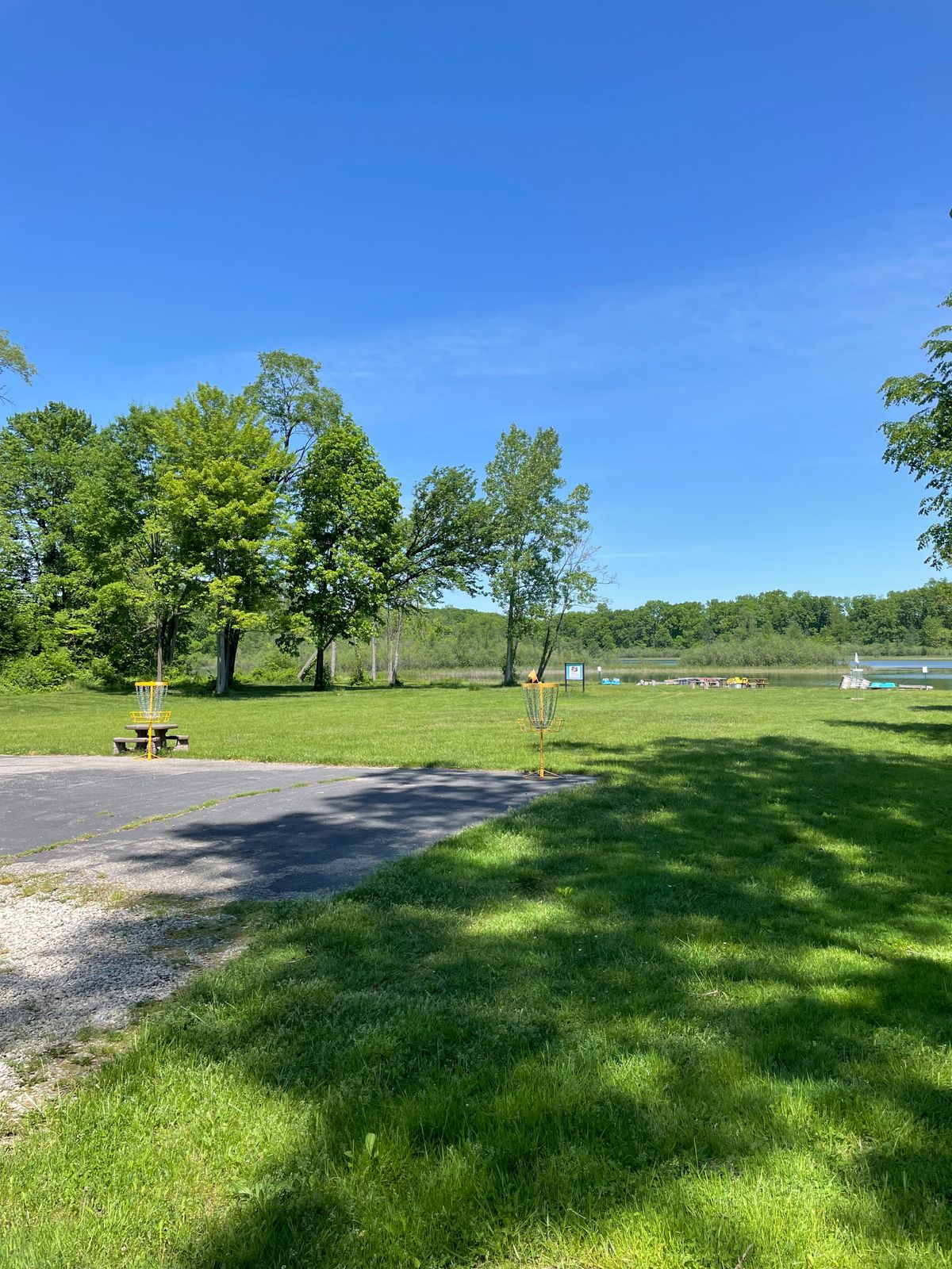View towards the lake with baskets or tees of 3, 4, and 5 in view