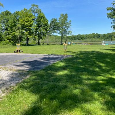 View towards the lake with baskets or tees of 3, 4, and 5 in view