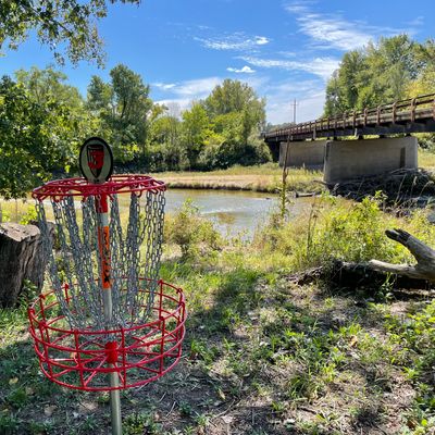 Hole 3 basket with River as back drop