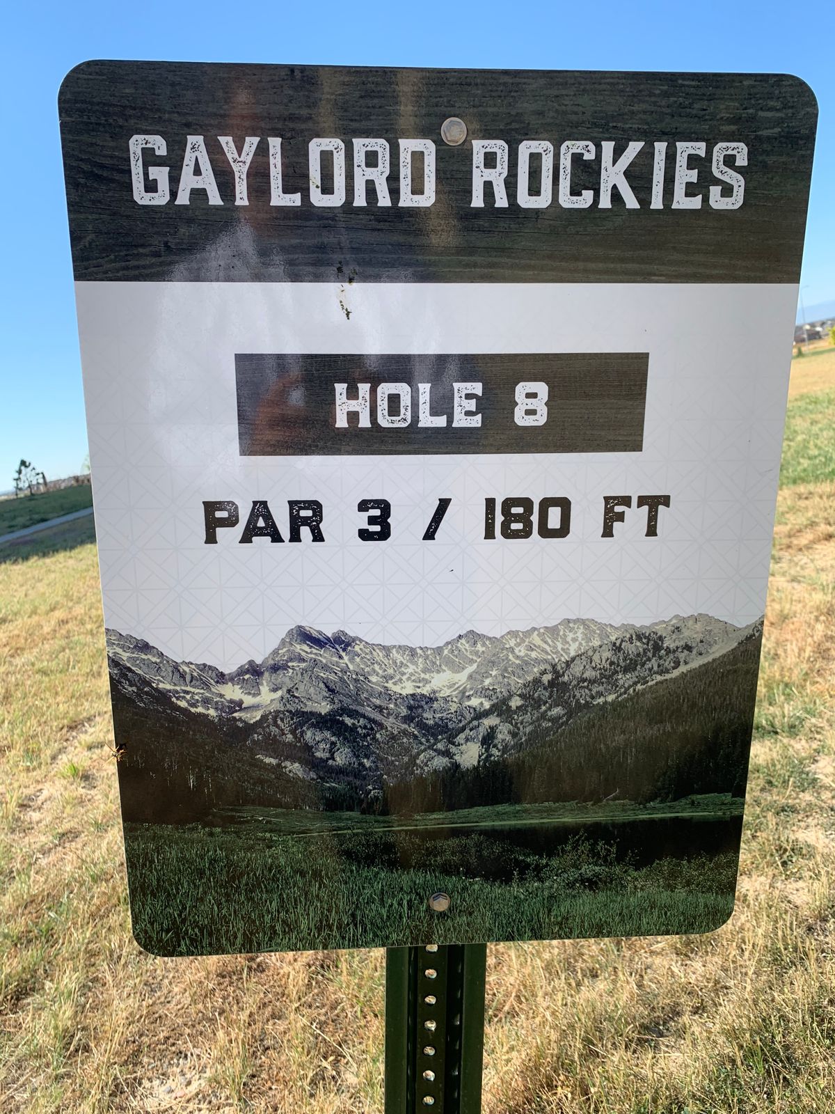 Tee off from dirt field.