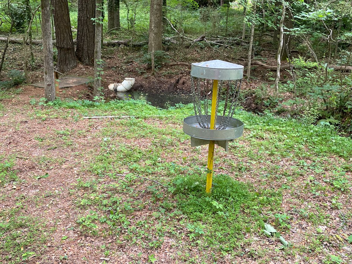 Small water hazard. Comes into play several times.