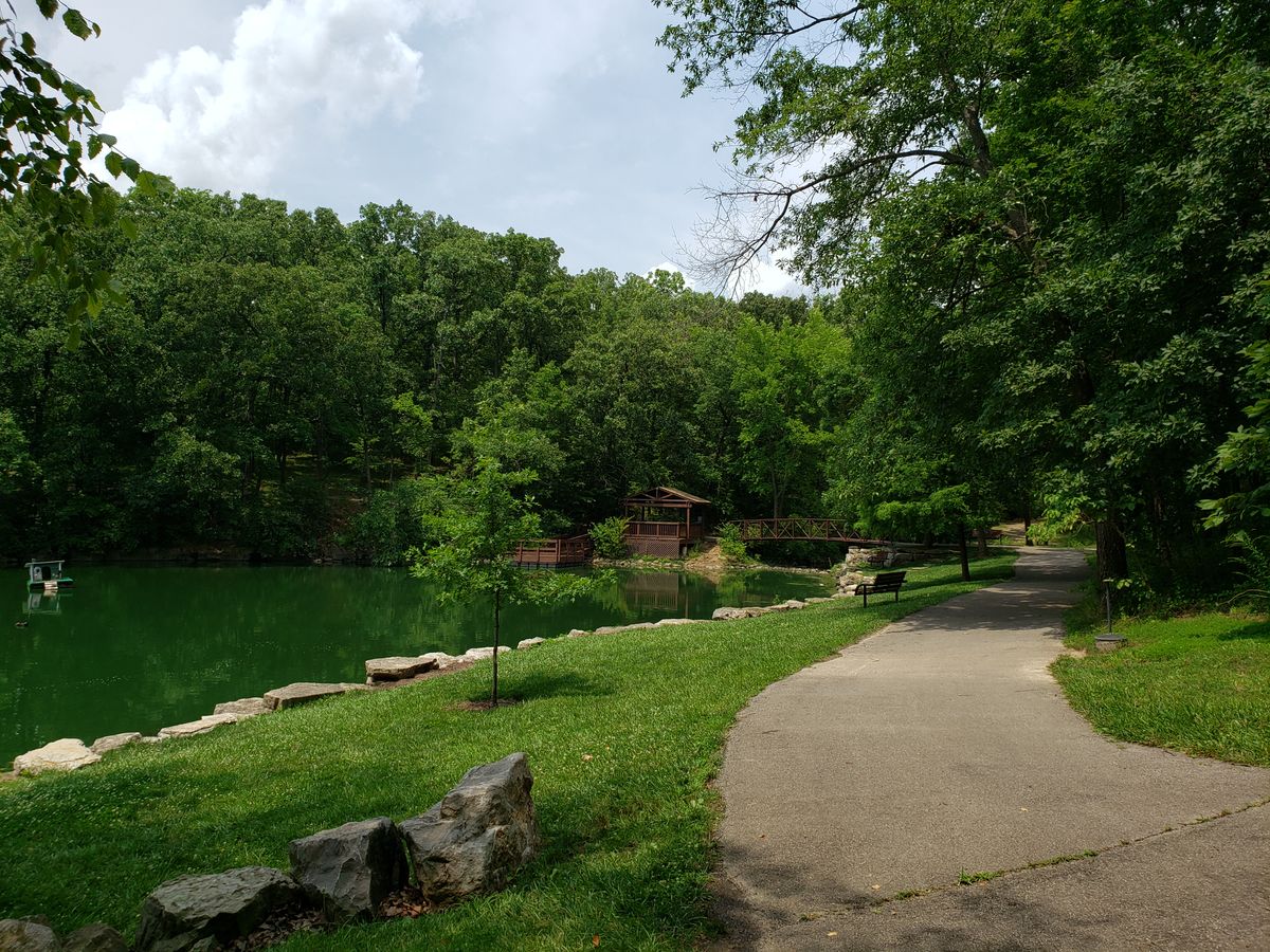 View of lake and foot bridge leading to #4